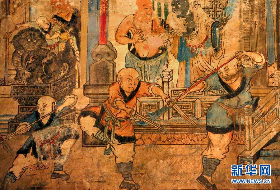 少林寺白衣殿內(nèi)的墻上表現(xiàn)少林武僧習(xí)武練拳的壁畫(局部,2005年9月15日攝)。