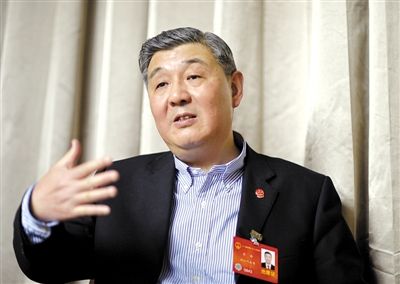 今年全國兩會期間，全國人大代表、浙江高院院長齊奇接受記者采訪。新京報記者 陳杰 攝